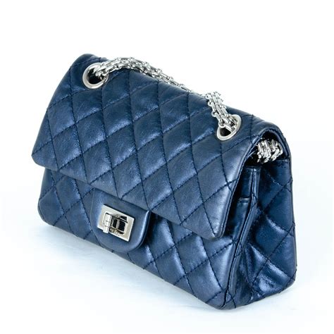 chanel 2 55 prezzo|Chanel quilted reissue shoulder bag.